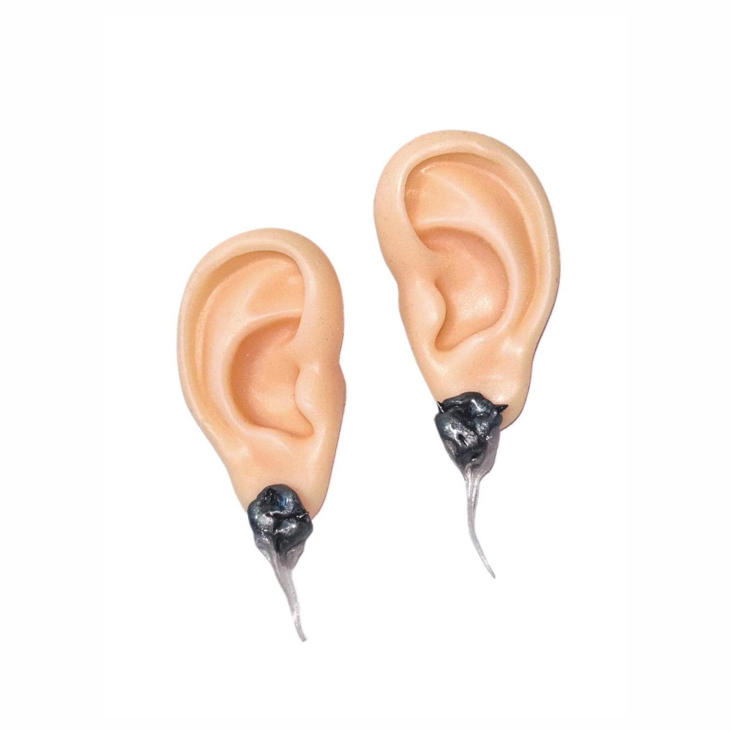 Melting tooth earrings