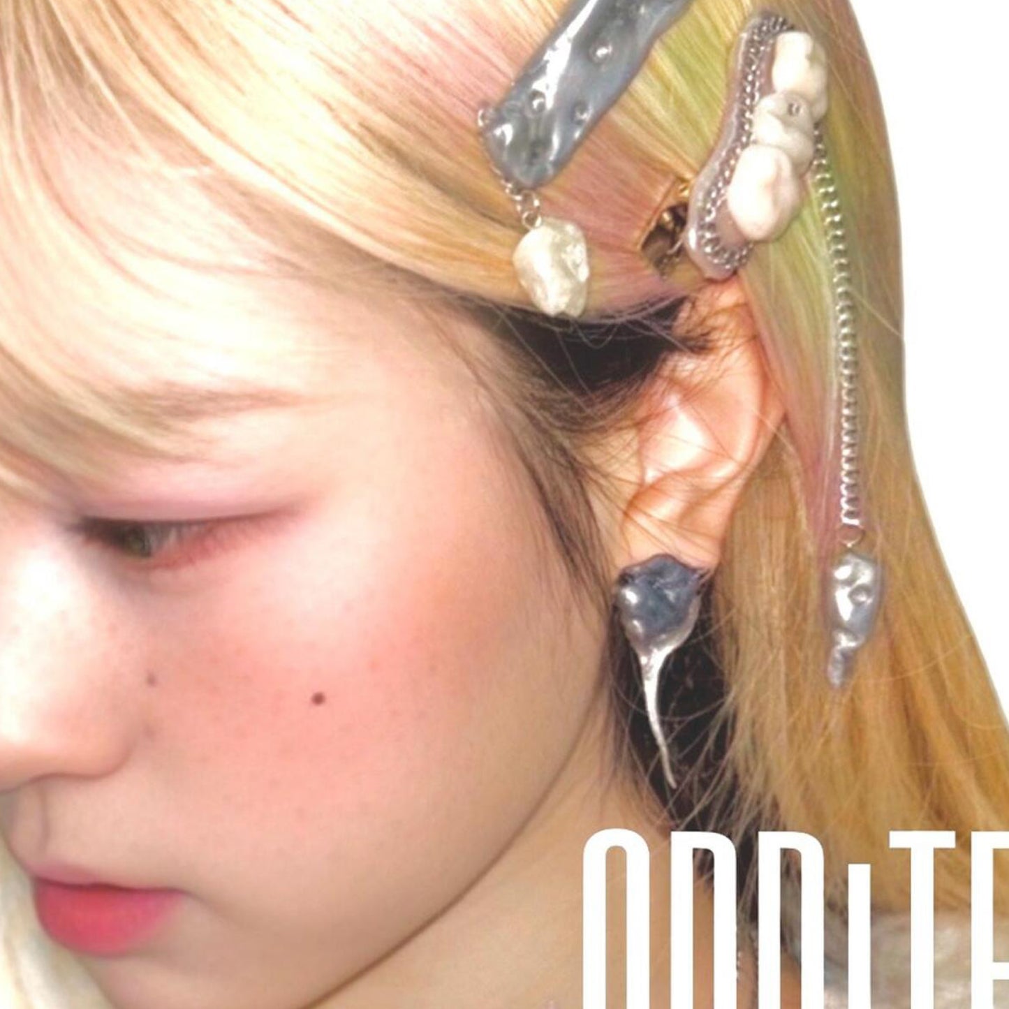 Melting tooth earrings