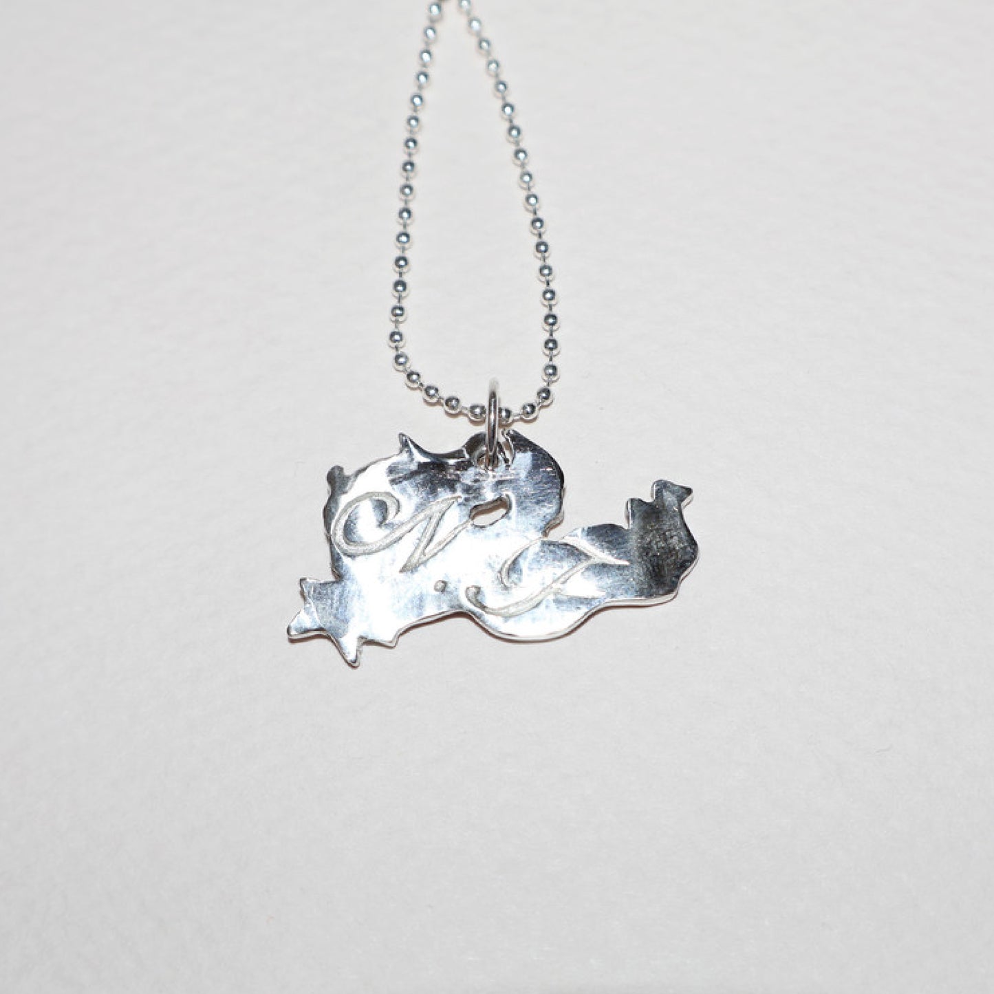 NF DEVIL NECKLACE